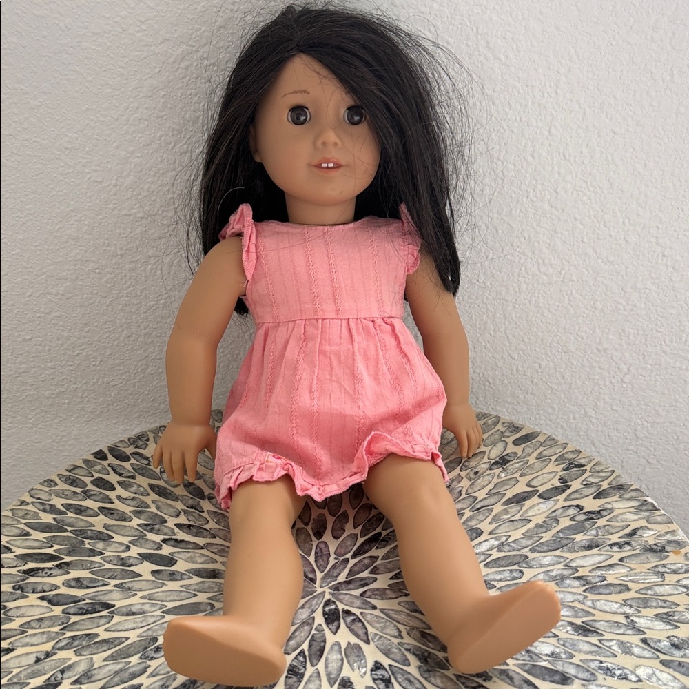 American Girl Doll in Pink Romper with Dark Brown Hair